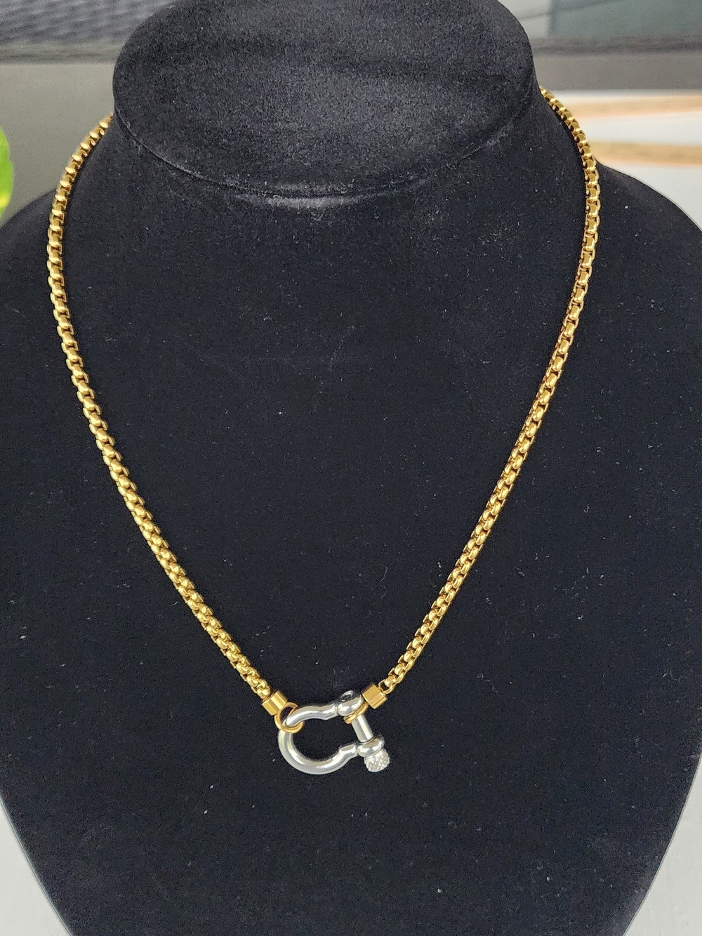 Gold Tone Chain Necklace with Silver Shackle Accent